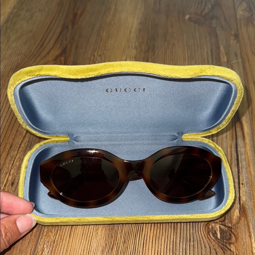 Gucci Brown Oval Sunglasses with Tinted Lenses